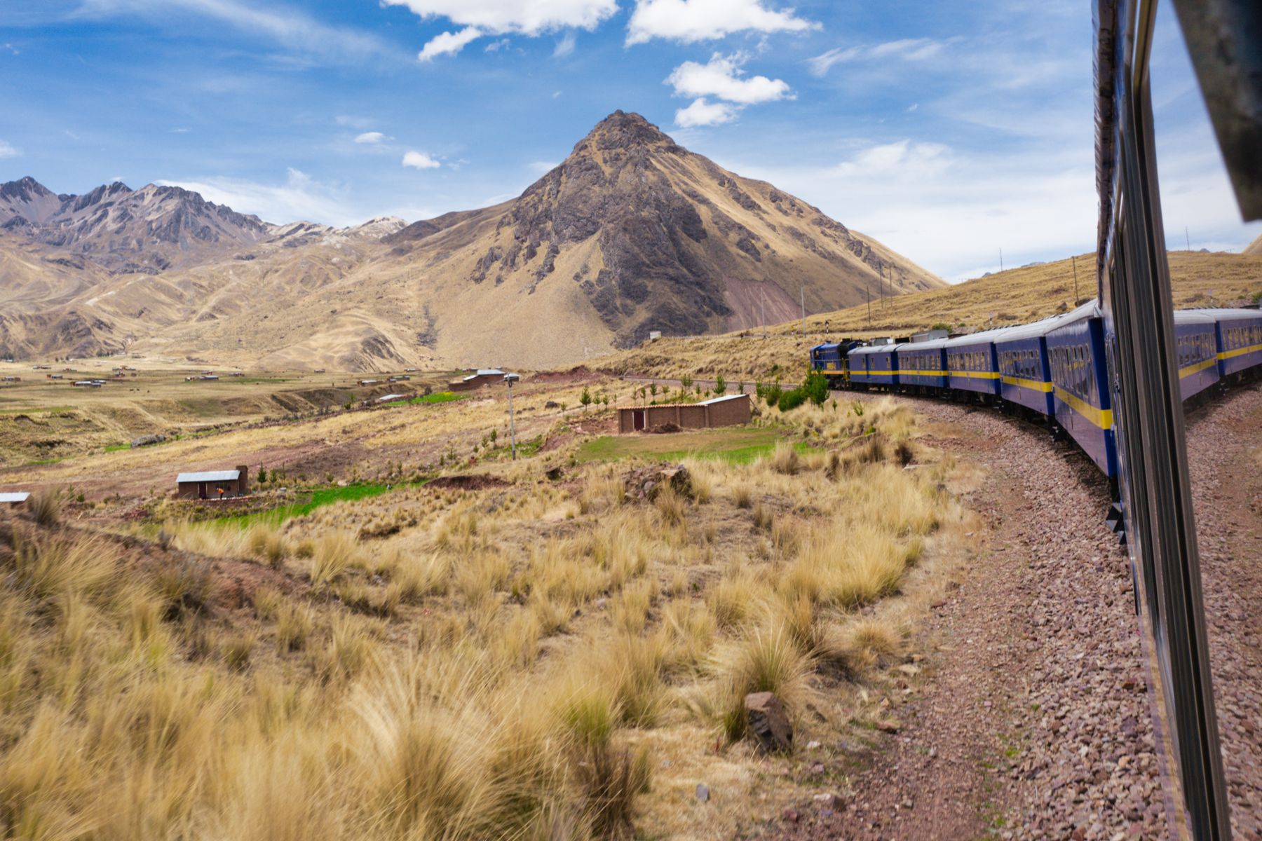 A scenic railway journey through the Peruvian Andes