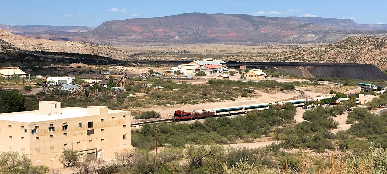 Verde Canyon Railroad train across the dry valley landscape near Clarkdale